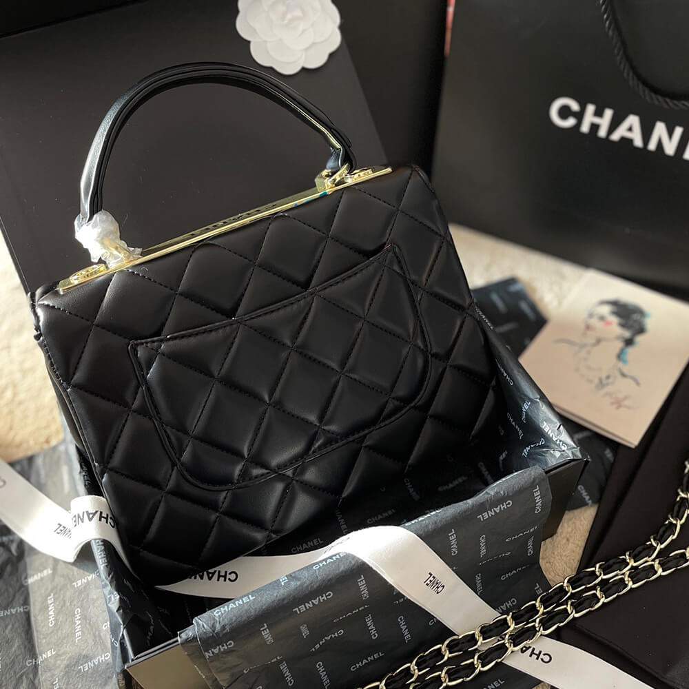 Ch*el flap bag with top handle