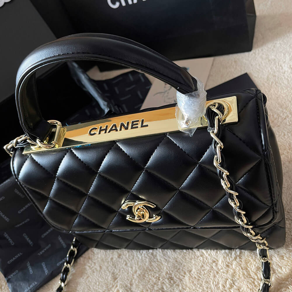 Ch*el flap bag with top handle