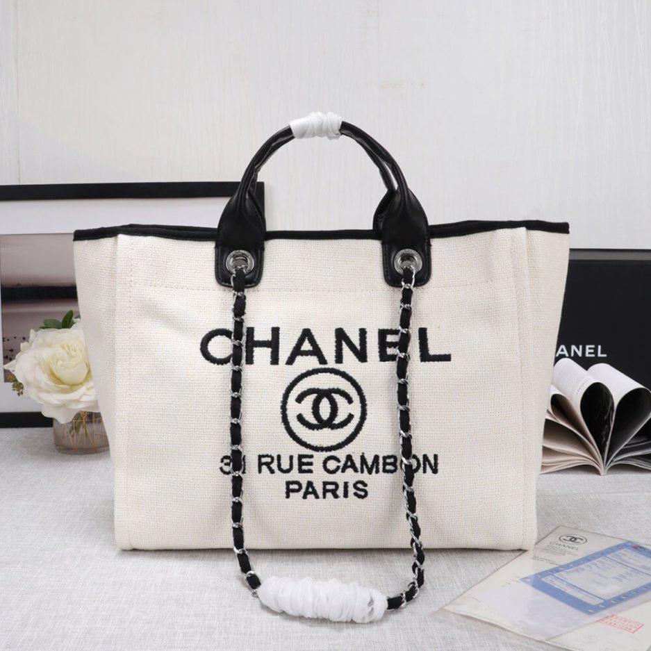 Ch*el woven straw raffia striped medium deauville tote