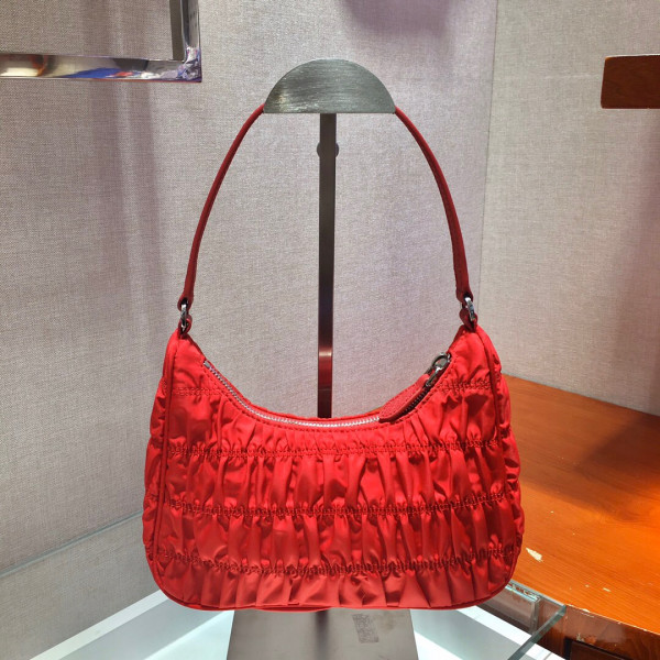 Pra*a nylon and saffiano leather mini bag