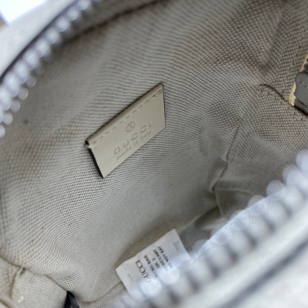 G*u*i gg embossed mini bag