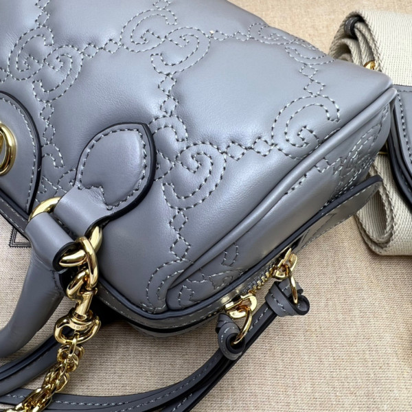 G*u*i gg matelassé leather top handle bag