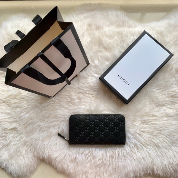 G*u*i leather zip around wallet