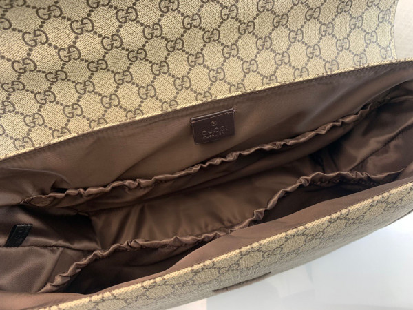 G*u*i gg plus diaper bag