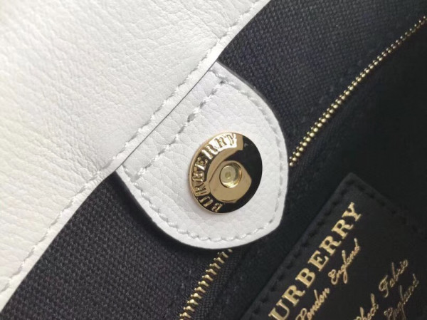 B**rry the small banner in leather and house check