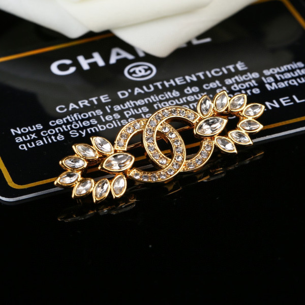 CL BROOCH