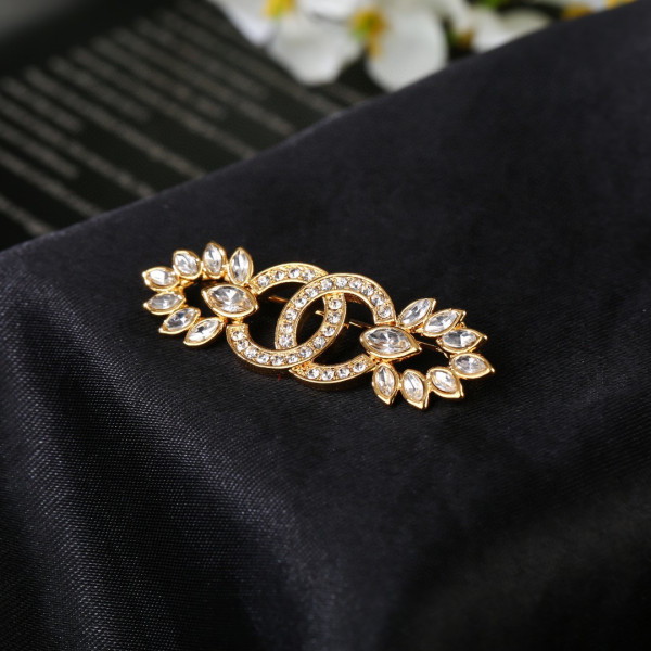 CL BROOCH