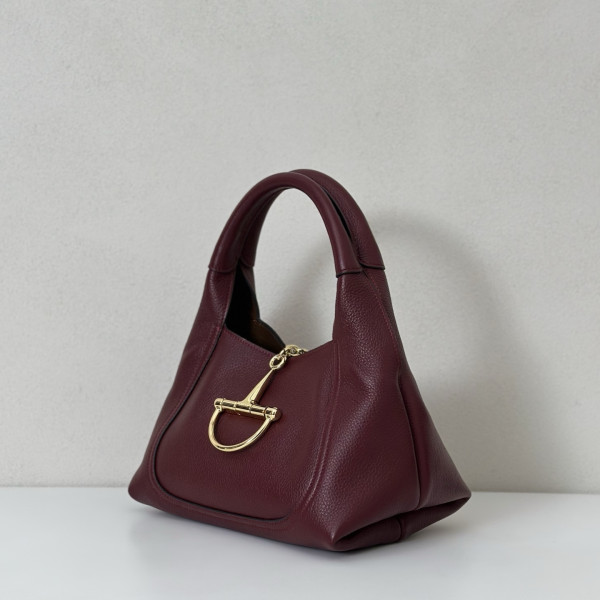 G*u*i softbit medium top handle bag